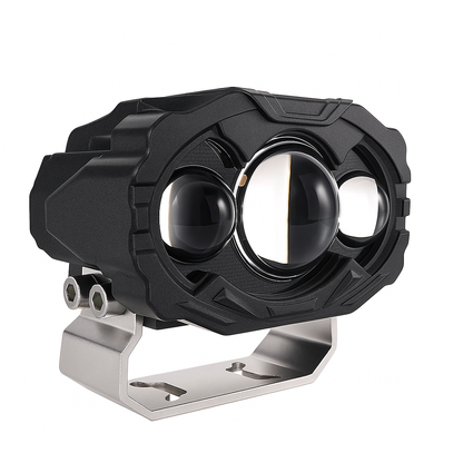 Heavy-duty automotive LED fog light with triple projector lens, mounted on a metallic bracket.